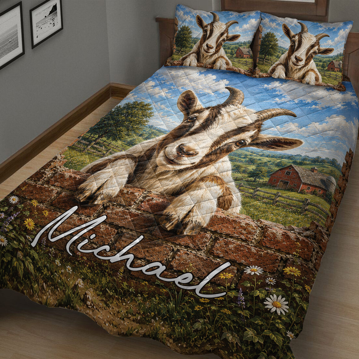 Rustic goat quilt blanket displayed across a bed with farm landscape artwork, blue sky, barn, and meadow flowers