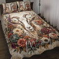 Goat quilt blanket displayed on a bed with floral artwork and a large horned goat portrait