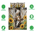 Goat quilt bedding set displayed with matching patterned pillowcases, sunflower accents, and feature icons