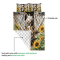 Goat quilt showing the colorful printed side and a white diamond-quilted reverse backing