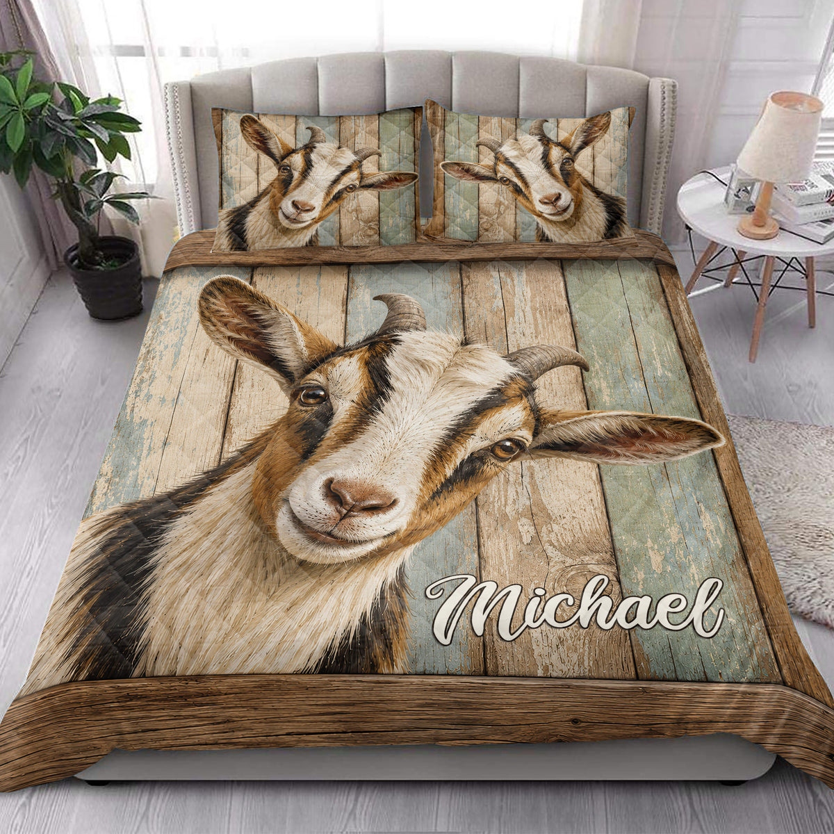 Goat quilt blanket styled in a bright bedroom with large animal artwork and rustic tones