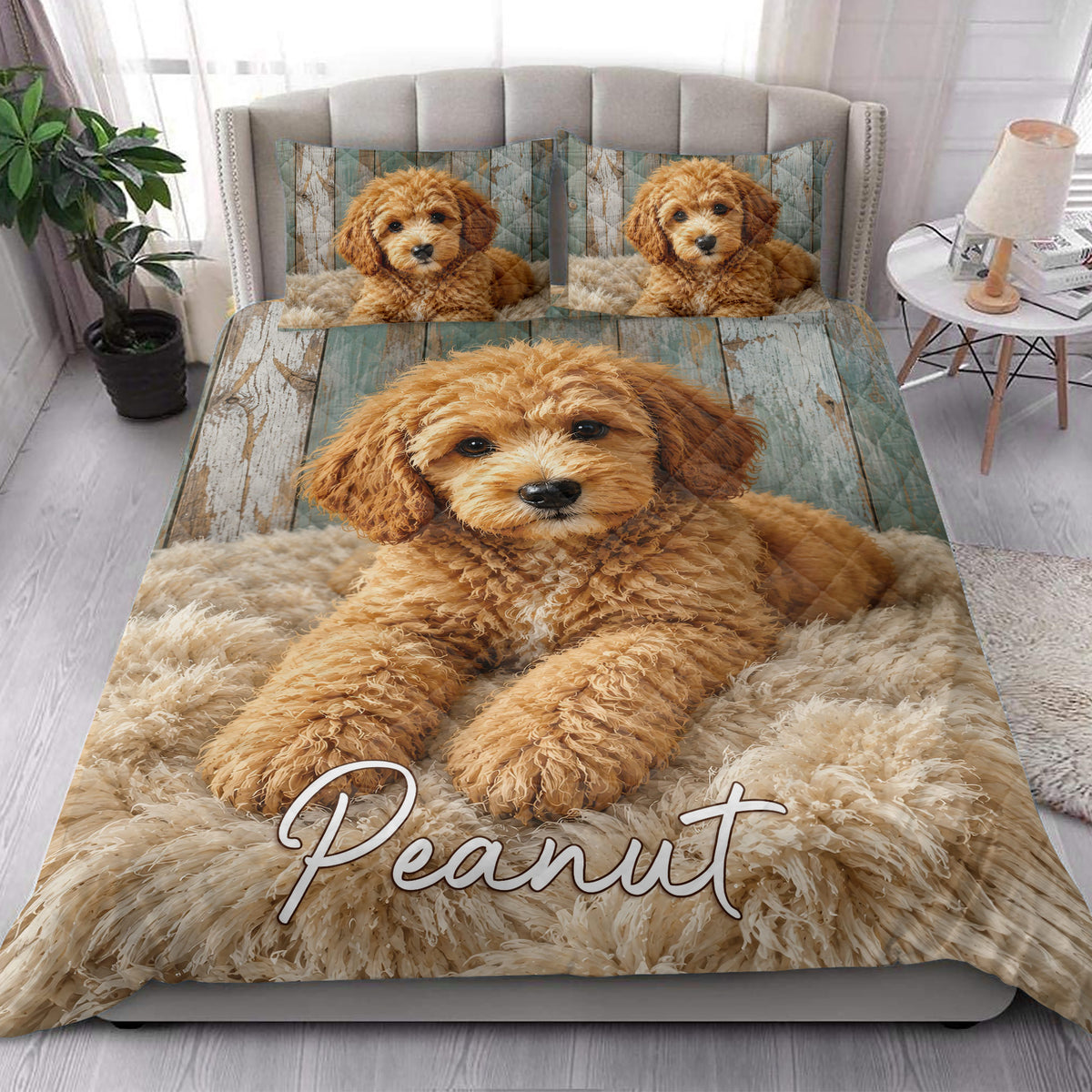 Labradoodle quilt bedding styled in a bright bedroom with large curly dog artwork