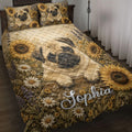 Pug quilt blanket spread across a bed with sunflower and wildflower artwork