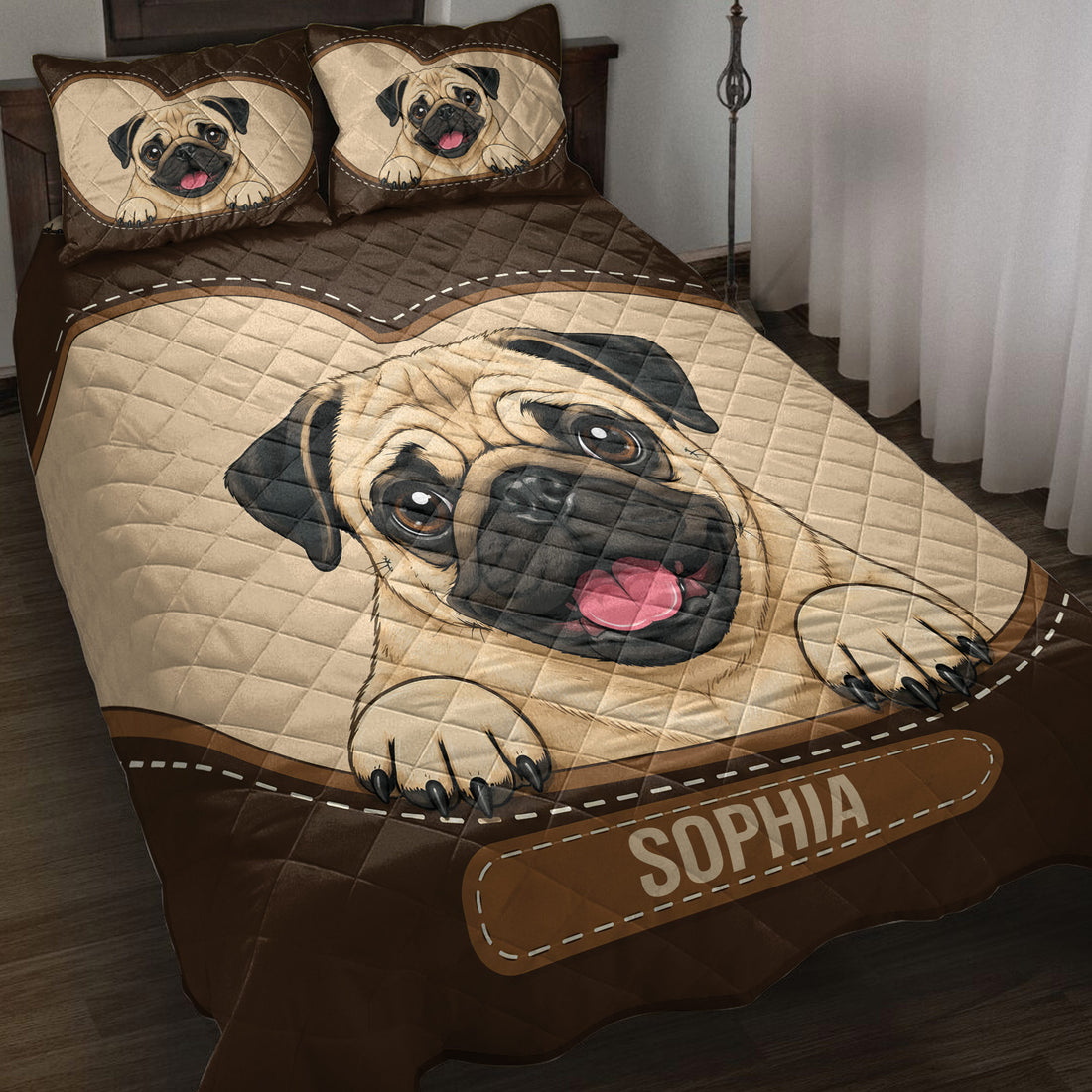 Pug quilt blanket displayed on a bed with large illustrated pug artwork and coordinating brown pillow designs