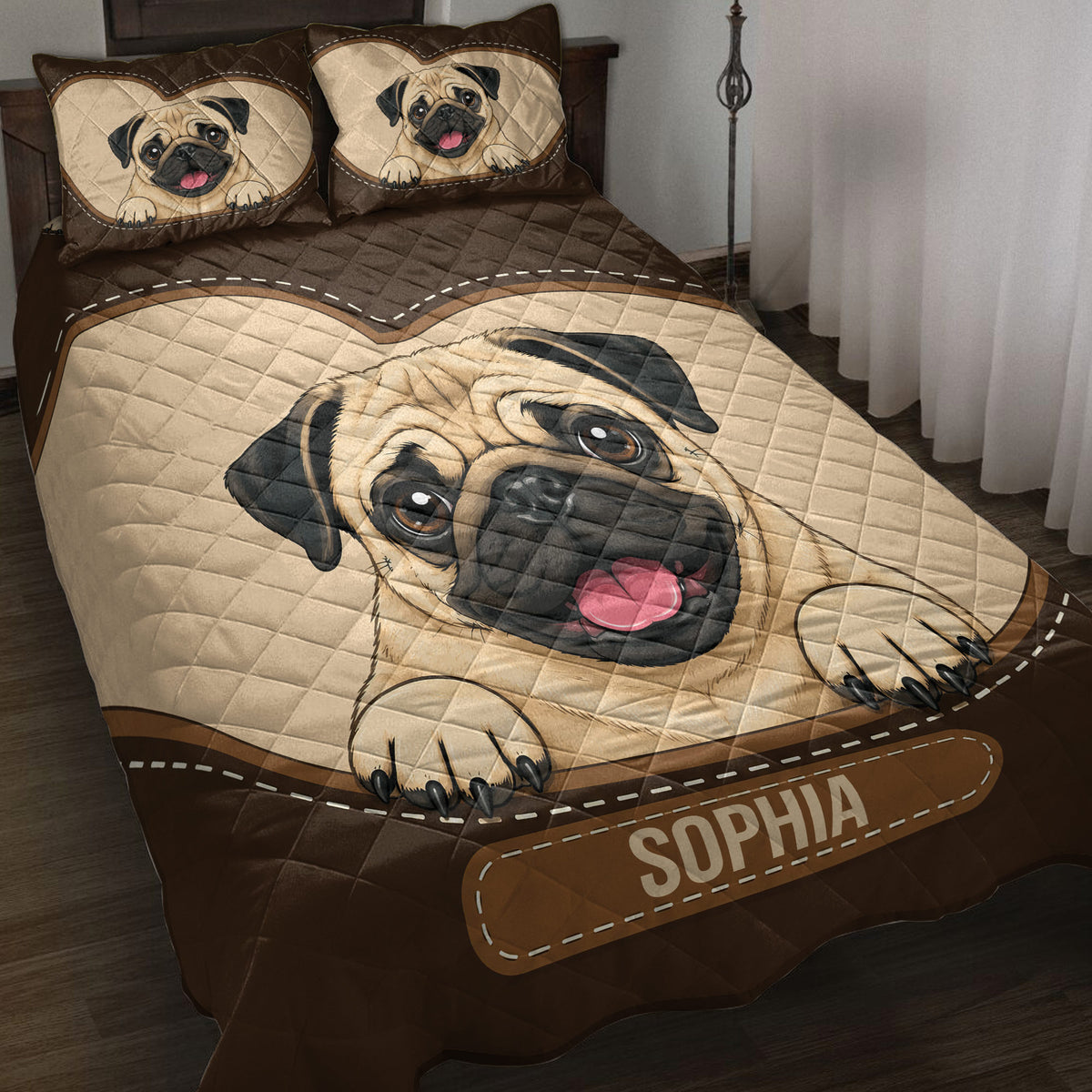 Pug quilt blanket displayed on a bed with large illustrated pug artwork and coordinating brown pillow designs