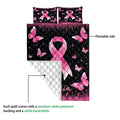 Pink ribbon and butterfly quilt showing the printed front and white quilted reverse