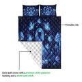 Diabetes awareness quilt showing a blue ribbon design, printed front, and white quilted backing