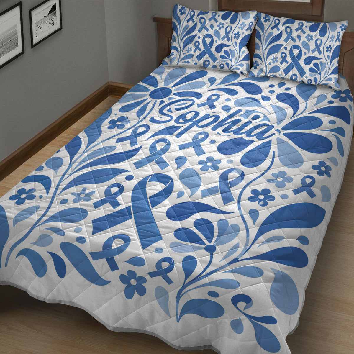 Close bedroom view of a blue diabetes awareness quilt blanket with floral ribbon artwork