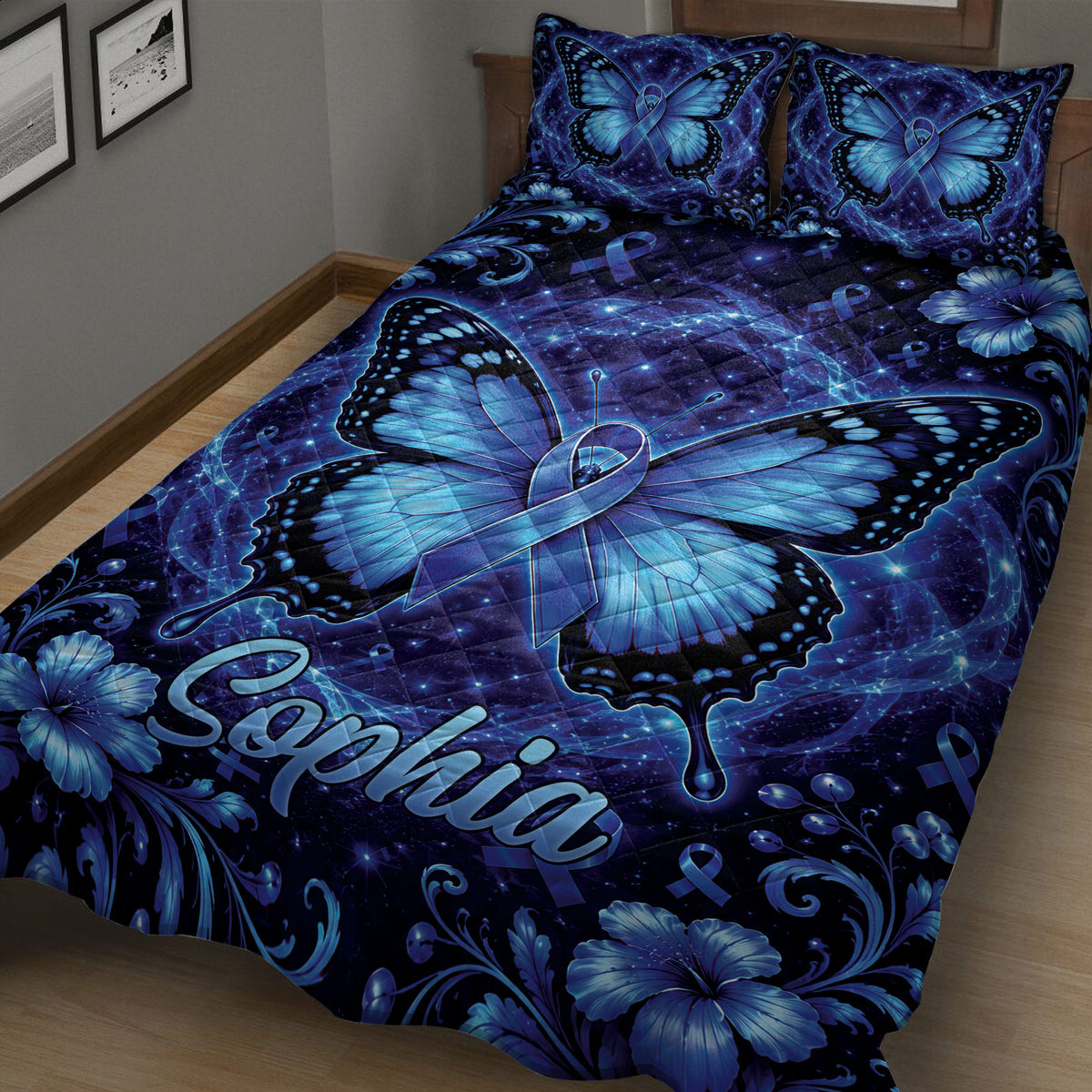 Close bedroom view of a blue butterfly diabetes awareness quilt with ribbons and floral accents