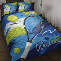 Tennis quilt blanket displayed on a bed with blue and lime artwork, rackets, and tennis balls