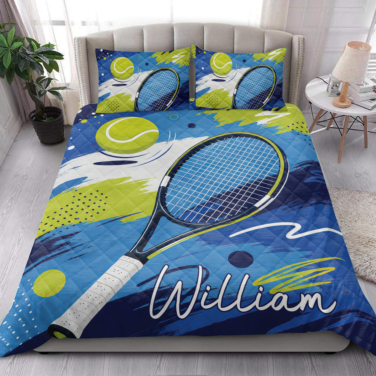 Tennis quilt bedding styled in a bright bedroom with racket and tennis ball artwork