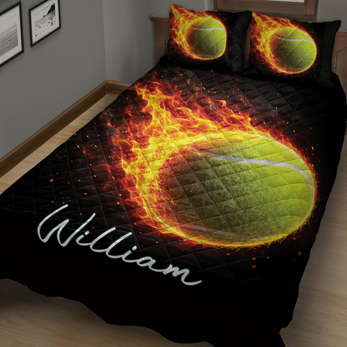 Close bedroom view of black tennis quilt bedding with dramatic flames surrounding a tennis ball