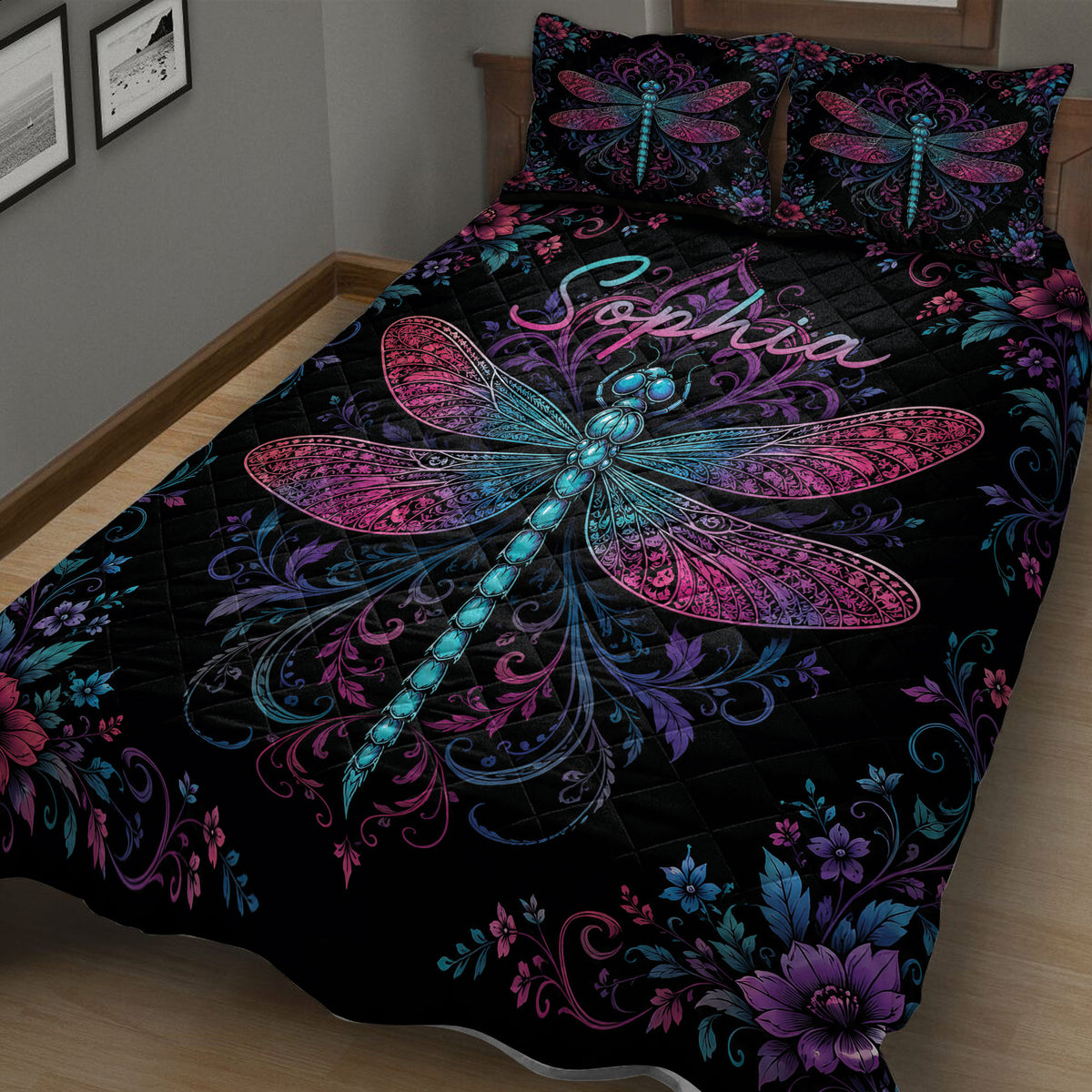 Close bedroom view of a black dragonfly quilt with jewel-toned wings and floral scrollwork