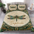 Dragonfly quilt bedding styled in a bright bedroom with matching dragonfly pillow designs