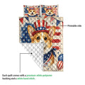 Corgi quilt close-up showing the printed front artwork and white diamond-stitched backing