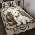 Westie quilt blanket displayed on a bed with paw prints, plaid accents, and a large white terrier design