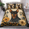 Miniature Pinscher quilt blanket styled in a bright bedroom with matching dog portrait accents