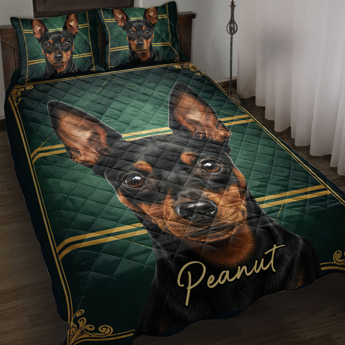 Miniature Pinscher quilt blanket displayed on a bed with black, green, and gold artwork