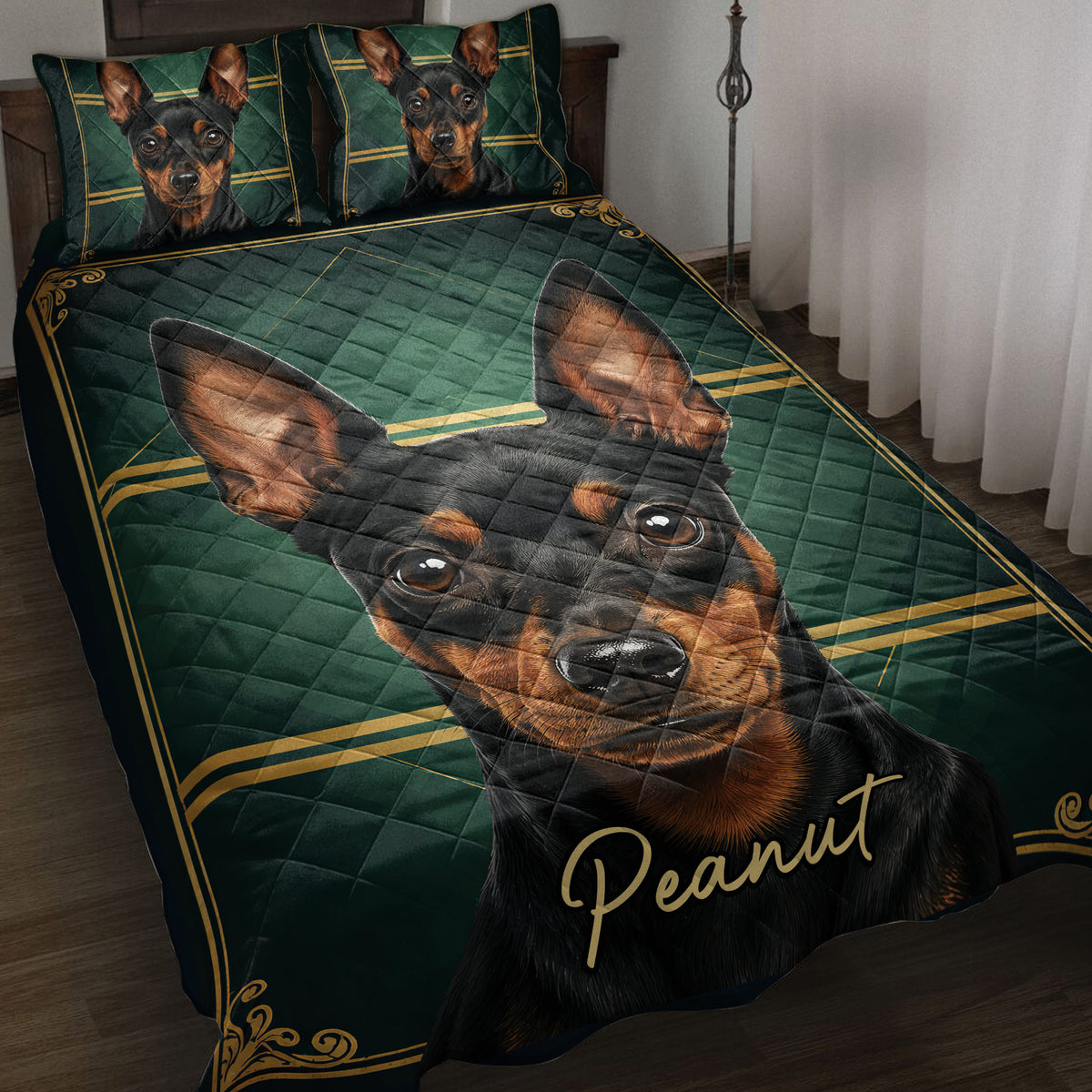 Miniature Pinscher quilt blanket displayed on a bed with black, green, and gold artwork