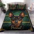 Miniature Pinscher quilt bedding set styled in a bright bedroom with coordinated dog artwork