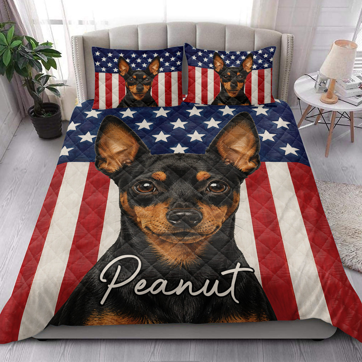 Patriotic Miniature Pinscher quilt bedding styled in a bright bedroom with coordinated bed accents