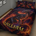 Close-up bedroom view of a dark dragon quilt blanket with glowing orange flames, wings, scales, and starry detail