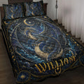 Dark blue and gold dragon quilt blanket styled on a bed with celestial moons, stars, and ornate borders
