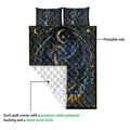 Dragon quilt close-up showing the printed celestial side and white diamond-stitched backing