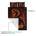 Dragon quilt blanket detail showing the printed front and white quilted backing