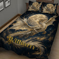 Close view of a dragon quilt blanket featuring a winged dragon, full moon, stars, and navy-gold tones