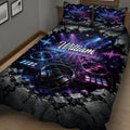 Close bedroom view of a DJ quilt blanket featuring mixing equipment, headphones, turntables, and neon blue and purple lights