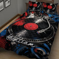 Close-up DJ quilt blanket with turntable, vinyl record, mixing console, and red and blue graffiti-style details