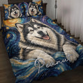 Alaskan Malamute quilt blanket displayed on a bed with two matching dog portrait pillows and blue cosmic artwork