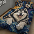 Close-up bedroom view of an Alaskan Malamute quilt blanket featuring a detailed dog portrait and blue artistic background