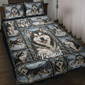 Alaskan Malamute quilt blanket displayed on a bed with snowy mountain artwork