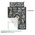 Alaskan Malamute quilt showing the printed front and white quilted backing