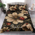 Ladybug floral quilt bedding styled in a bright bedroom with large flowers and red ladybugs