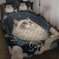 Ragdoll cat quilt blanket displayed on a bed with blue eyes, stars, leaves, and dark blue artwork