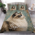 Ragdoll cat quilt blanket displayed in a bright bedroom with coordinated cat pillow artwork