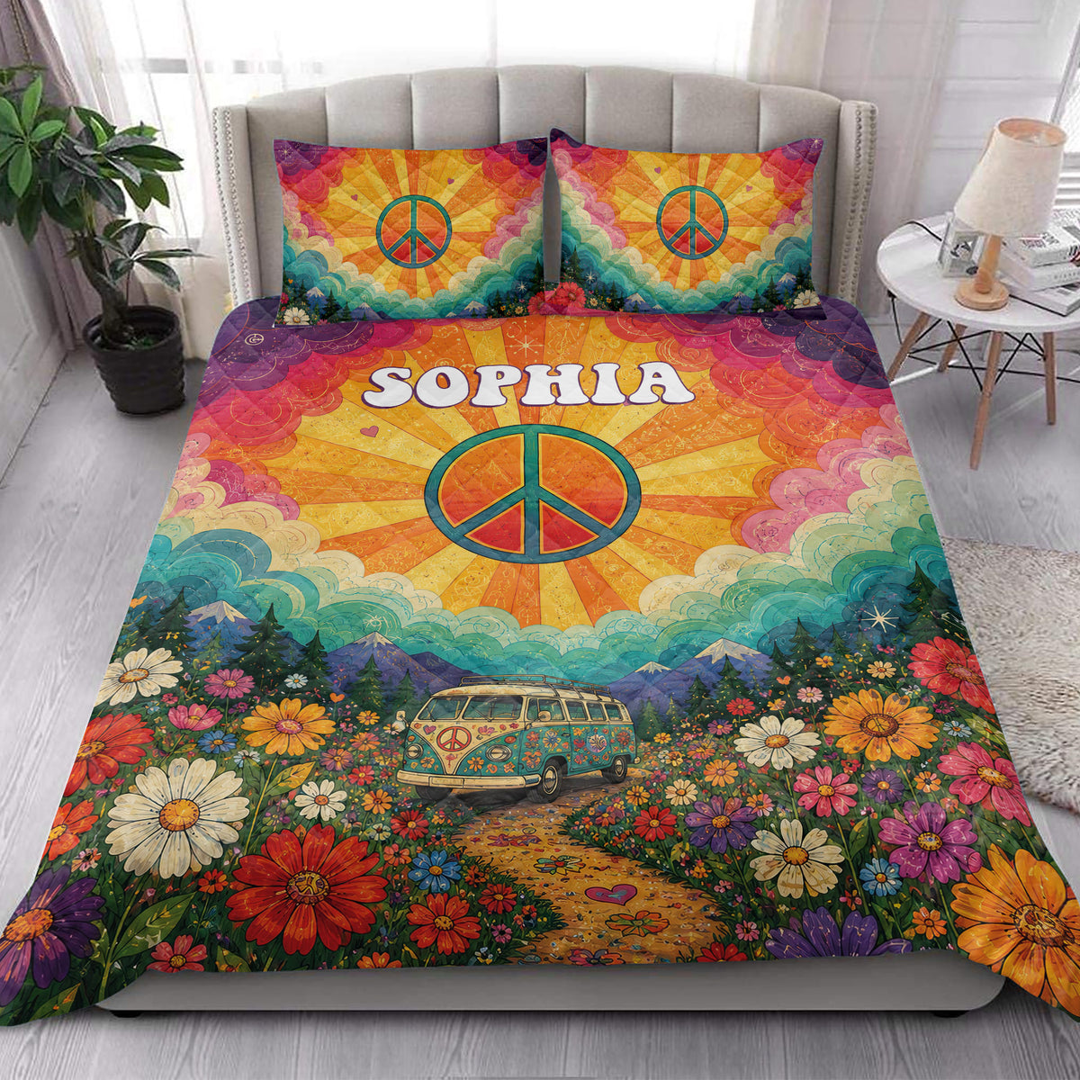 Hippie quilt blanket styled in a bedroom with peace signs, mountains, flowers, and retro van artwork