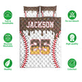 Baseball quilt bedding set shown with coordinating pillow designs and illustrated baseball stitching details