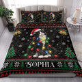 Tuxedo cat Christmas quilt styled in a bright bedroom with red bows, hearts, plaid, and Santa hat artwork