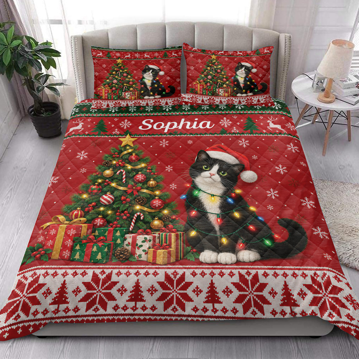Tuxedo cat Christmas quilt styled on a bedroom bed with colorful lights, snowflakes, bells, and festive borders