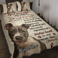 Pitbull quilt blanket spread across a bedroom with realistic dog portraits, paw prints, and heartfelt artwork