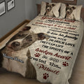 Pitbull quilt blanket displayed on a bed with large dog portrait, paw prints, and heartfelt family message
