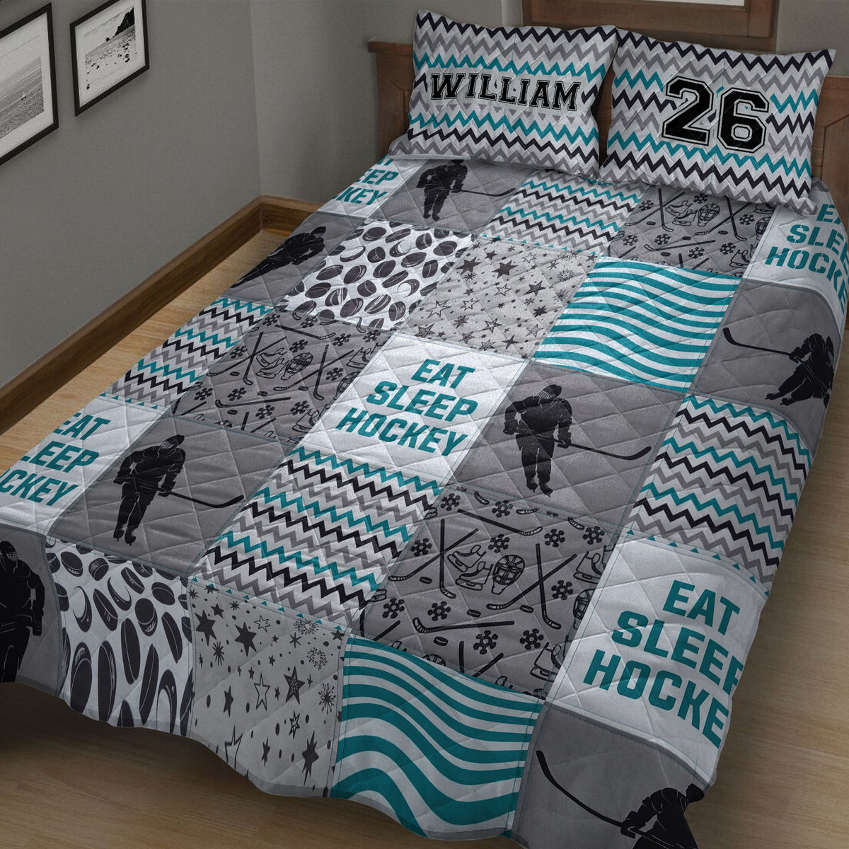 Hockey quilt blanket displayed on a bed with hockey player silhouettes, puck patterns, stars, and teal waves