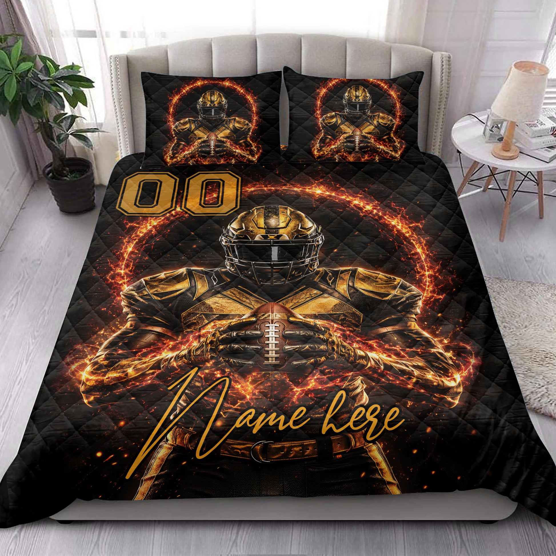 American football quilt blanket styled on a bedroom bed with matching black and gold football artwork