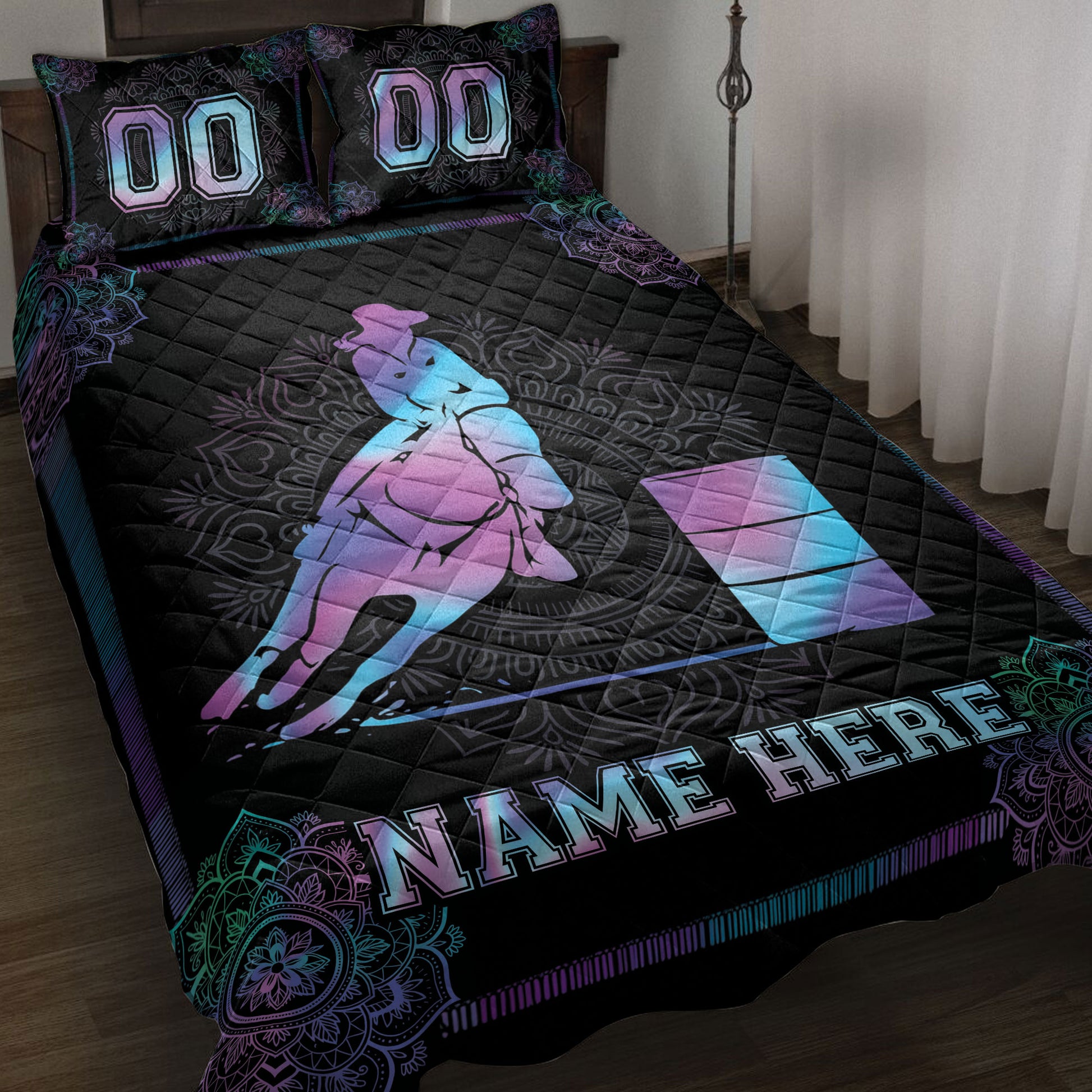 Barrel racing quilt blanket displayed on a bed with a colorful horse and rider design on black bedding