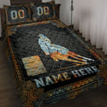 Barrel racing quilt blanket displayed on a bed with horse and rider artwork, ornate black and gold western border