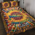 Colorful hippie quilt blanket displayed on a bed with sunflowers, peace symbols, and psychedelic artwork